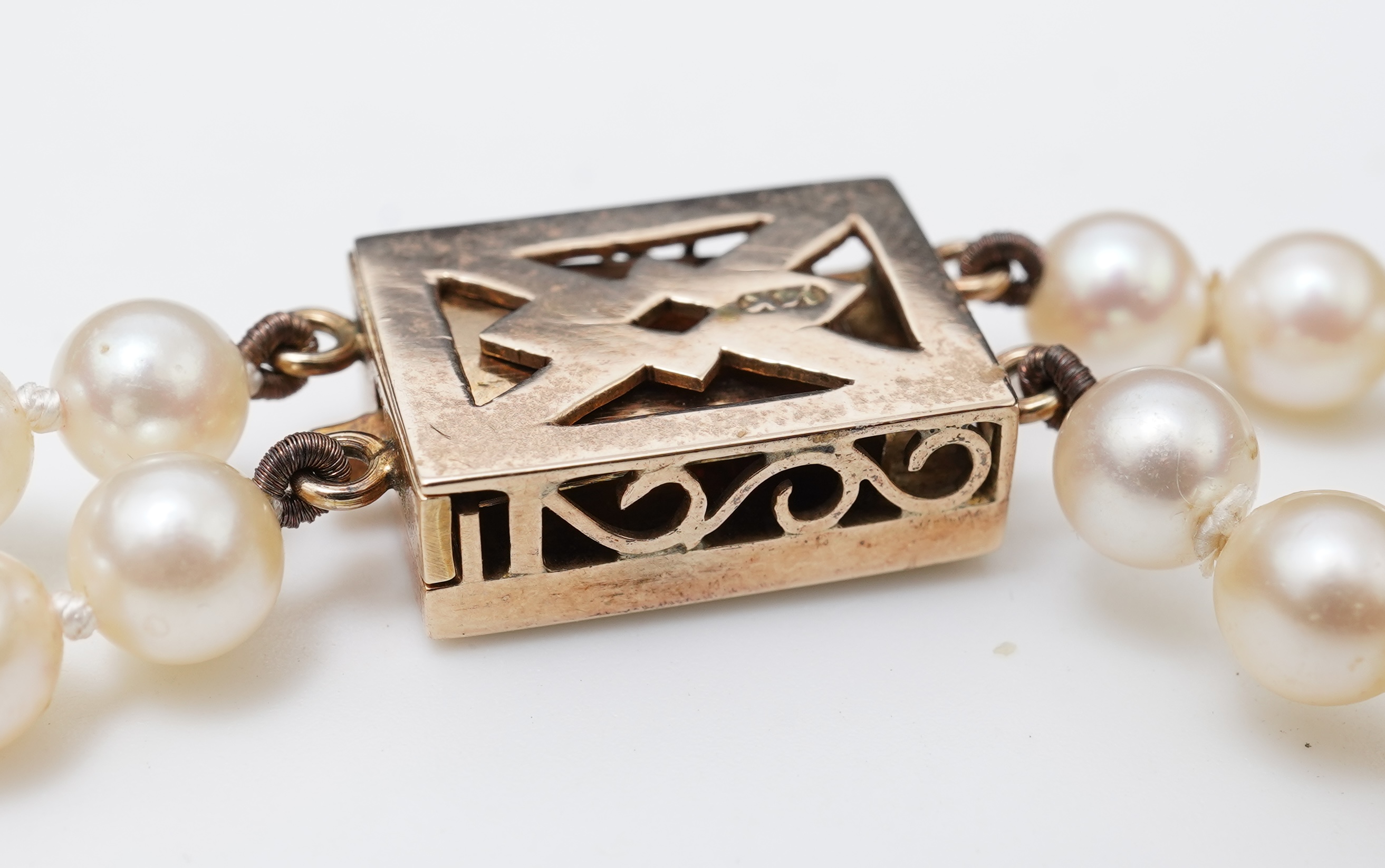 A cultured pearl and ruby necklace